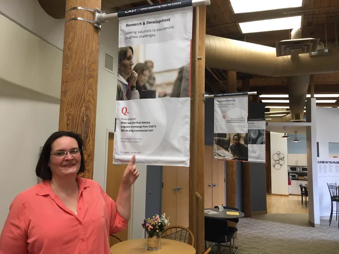 Mindy J shows off new banners at cast!