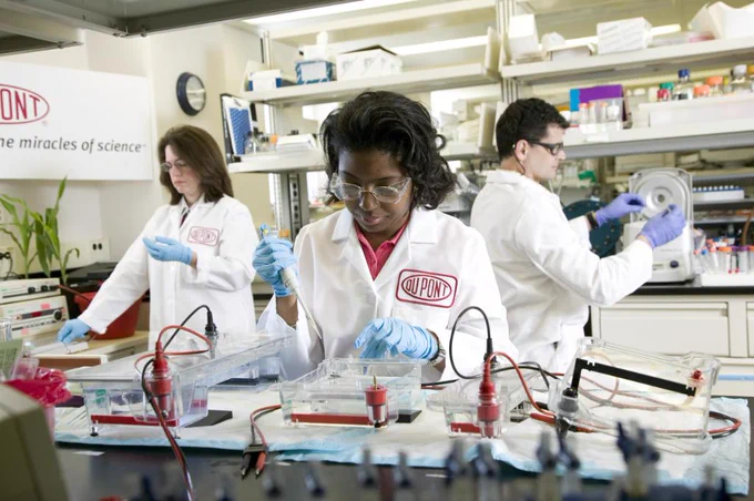DuPont research scientists at work in a biobutanol molecular biology lab - from left to right: microbiologist Dr. Lori Maggio-Hall, biochemist Annette Howard and molecular biologist Joseph Tuminello.DuPont Image 