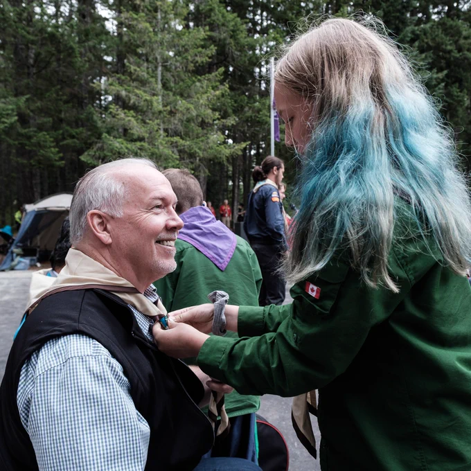 Getting a scouts necker put on.
