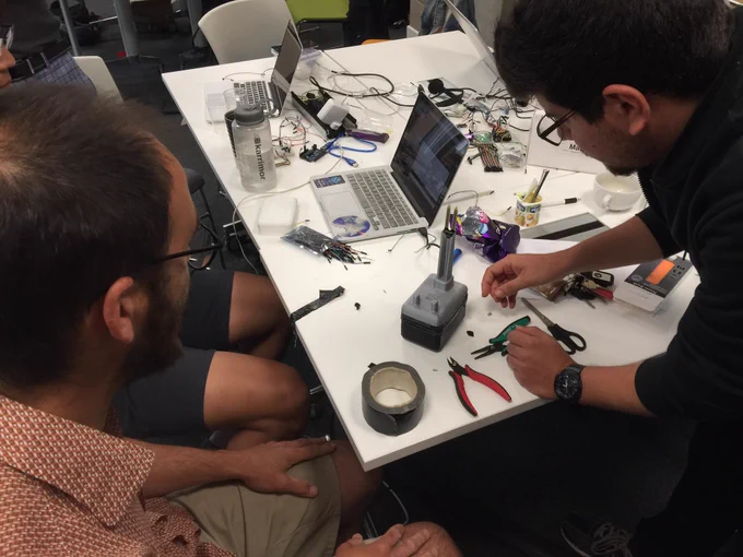 Frantic group assemble their electronics and sensors.
