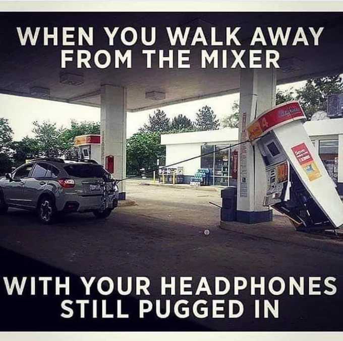 
 Description of picture  Car with gas hose still in it and the fuel pump is leaning towards the ground . 

caption of picture 
"when you walk away from the mixer when your headphones are still attached ."
