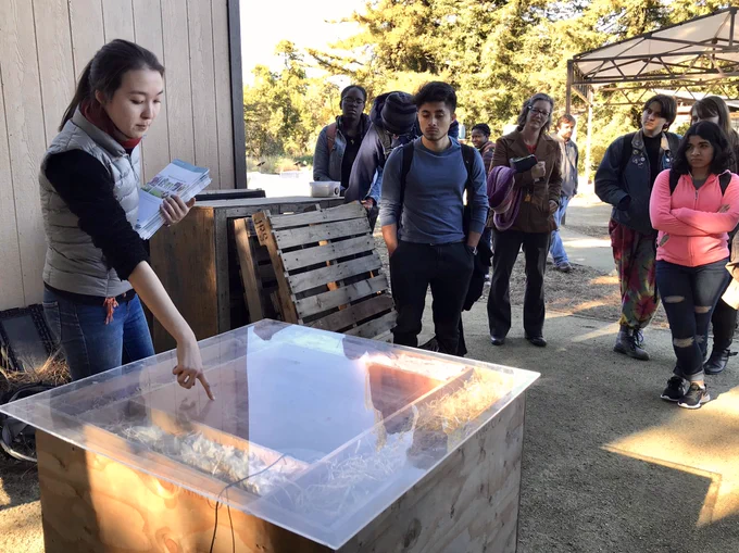 Speaker points out insulation types from a D-Lb demonstration to student group