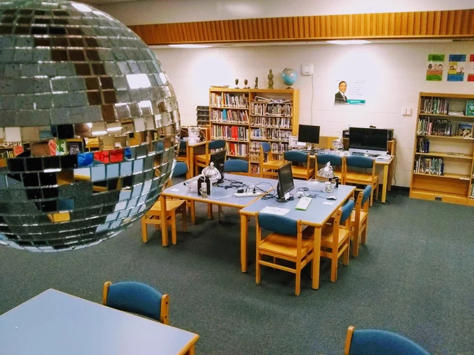 disco ball in library overlooking Raspberry Pi computers