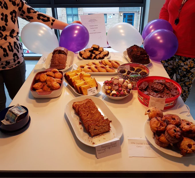 Table laden with cakes, scones, muffins and more!