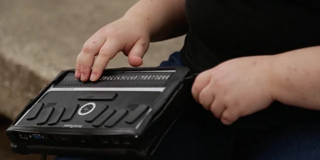 a student is using a braille notetaker