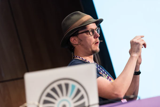 Close-up of Juho Vepsäläinen speaking at typeof conf