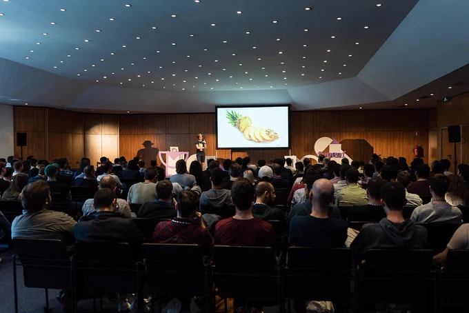 Wide shot of Juho Vepsäläinen speaking at typeof conf