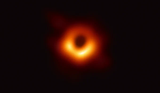 Orange ring of light on a dark background