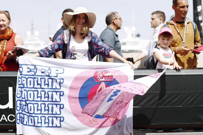 A fan proudly displays a banner for Lance.