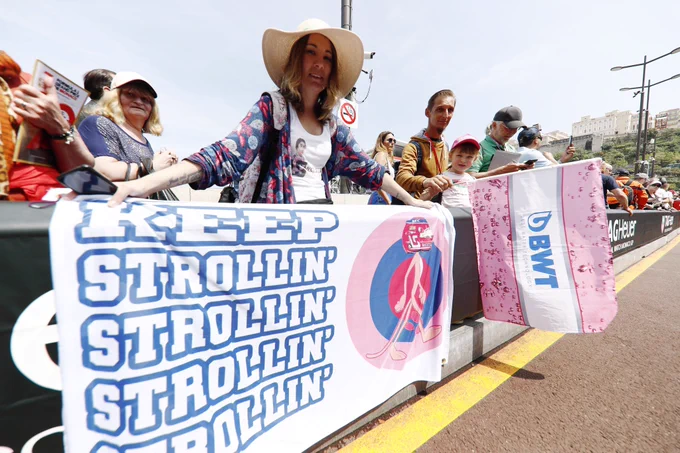 A fan proudly displays a banner for Lance.
