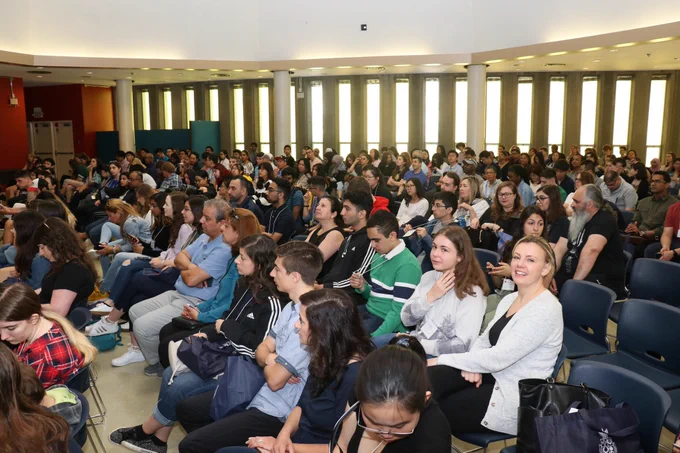 A crowd of students and parents in BR 200 in Brennan Hall on the St. Michael's College campus.