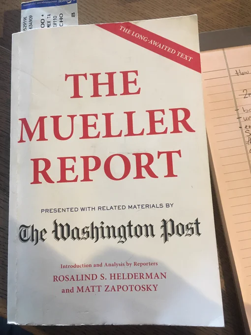 My copy of the Mueller report, with book mark and notes.