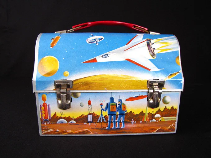 A lunchbox with a space motif.