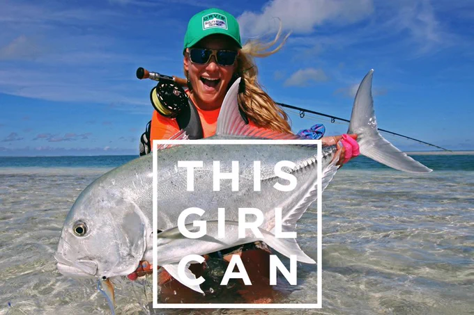 woman holding a fish with this girl can logo over the top