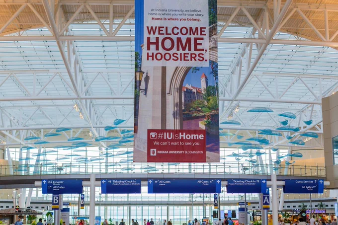Welcome home, Hoosiers sign hangs prominently inside the Indianapolis International Airport