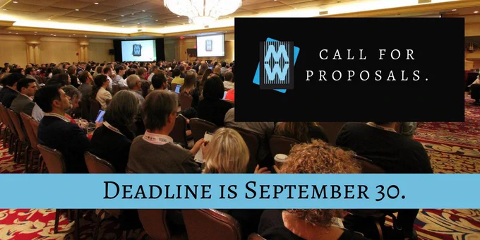 A crowd of people listening to a lecture at the MWXX conference in Los Angeles.