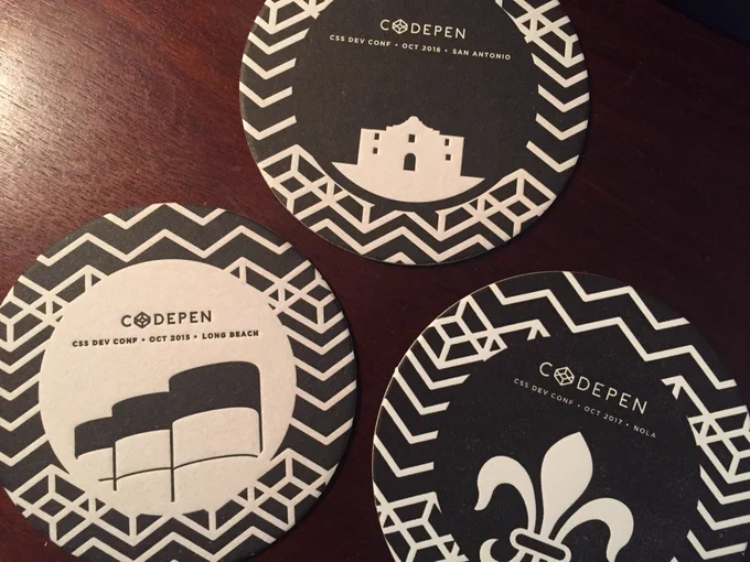 CodePen drink coasters from CSS Dev Conf. I'm going to be buried with these.