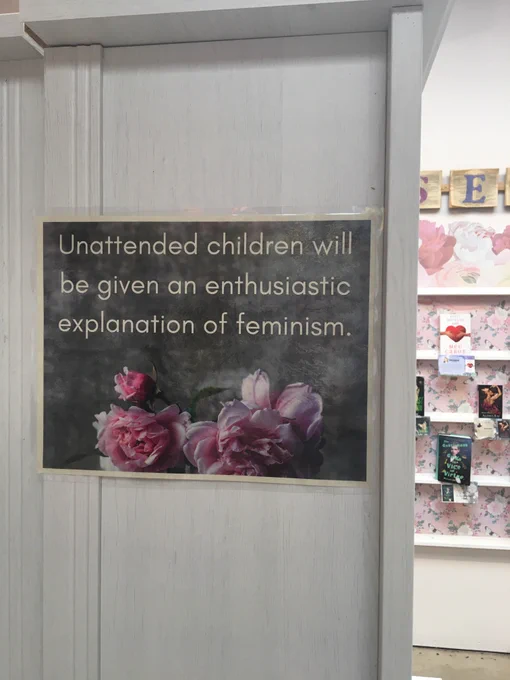 sign reading "unattended children with be given an enthusiastic explanation of feminism."