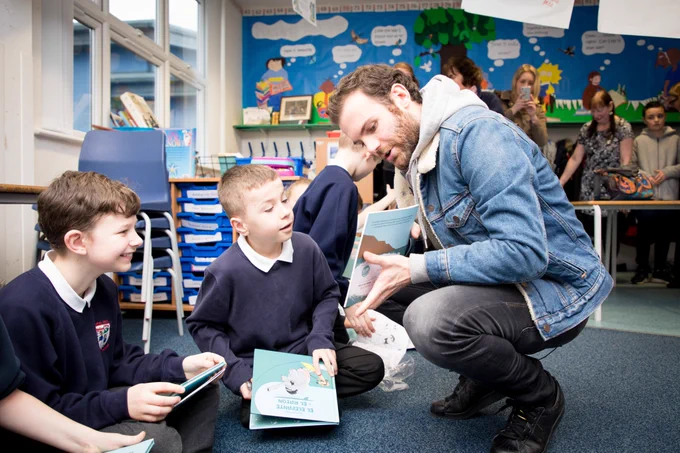 Juan Mata donates Spanish books to Royton Hall Primary School to celebrate World Book Day