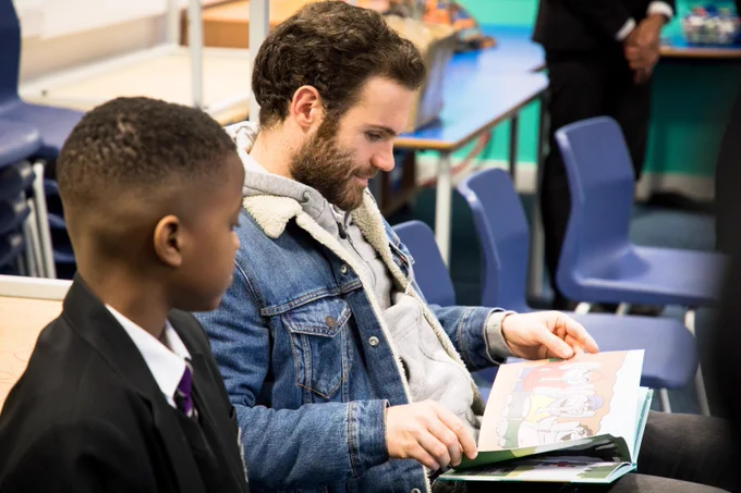 Juan Mata donates Spanish books to Royton Hall Primary School to celebrate World Book Day