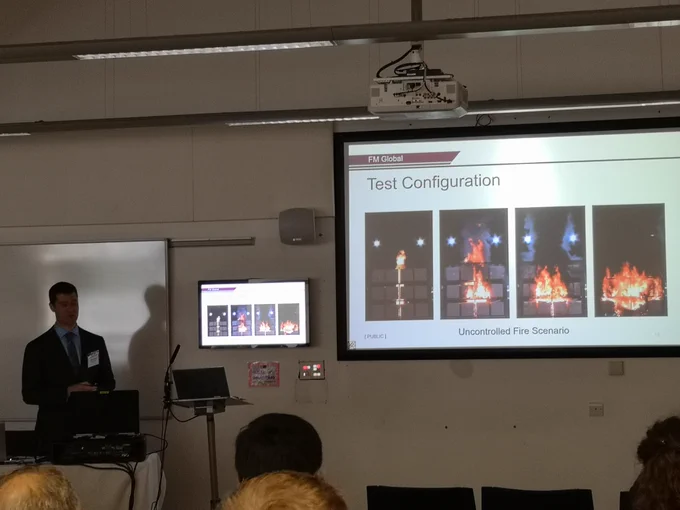 man presenting powerpoint slides on test configuration