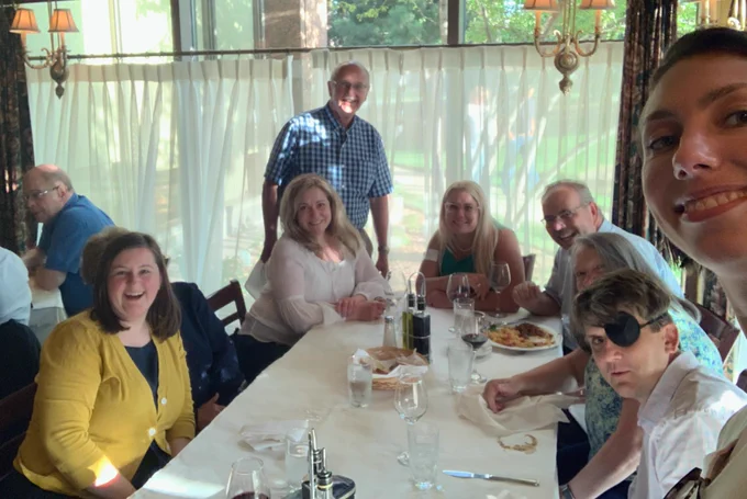 Picture of people at a dinner table