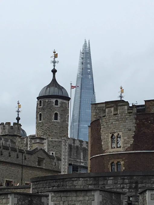 The Shard towers behind the Tower of London