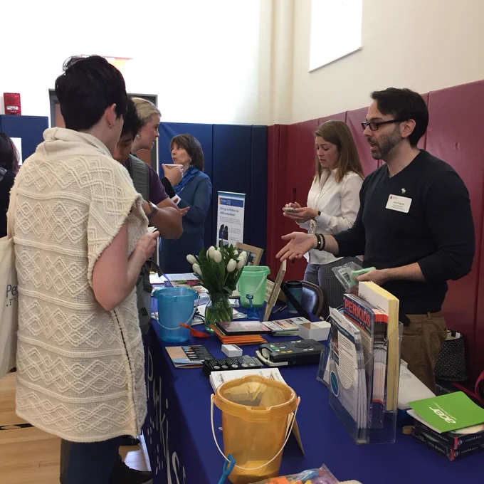 Parents at Perkins Outreach exhibitor tables