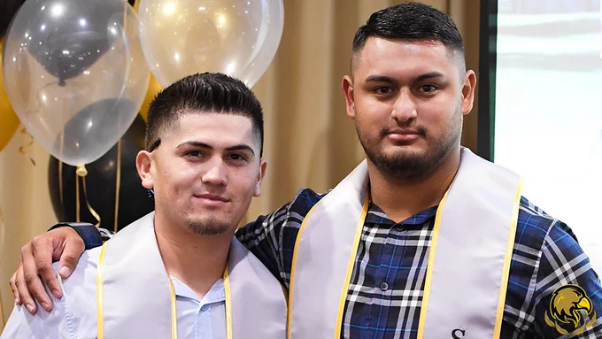 Anthony and George pose with their awards.
