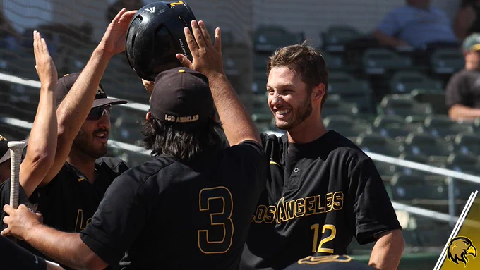 Jordan Peabody celebrates with teammates.