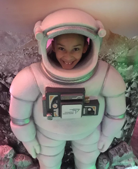 student in an astronaut costume