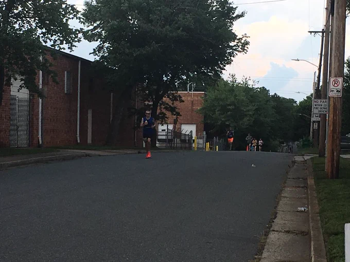 Racers coming up a hill on the course!