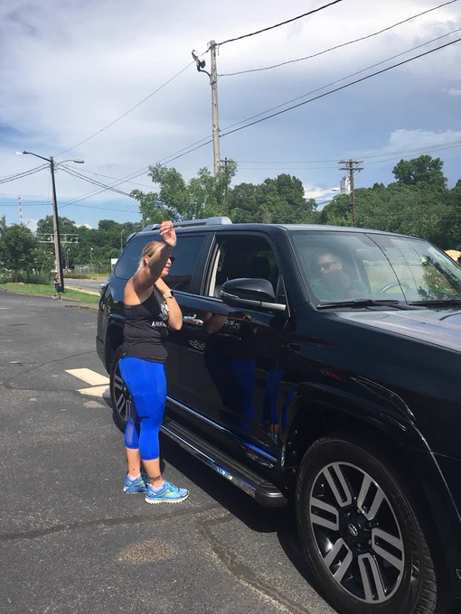 My friend Laura helping someone park their car