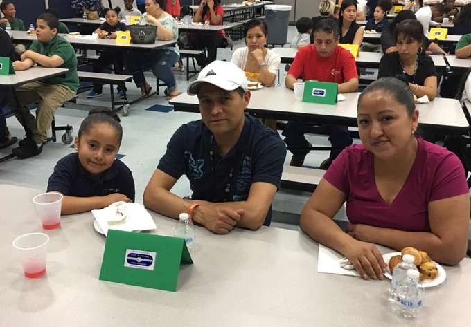 students and their families at the behavior hall of fame induction ceremony