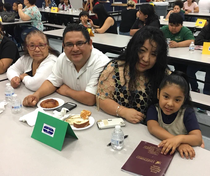 students and their families at the behavior hall of fame induction ceremony