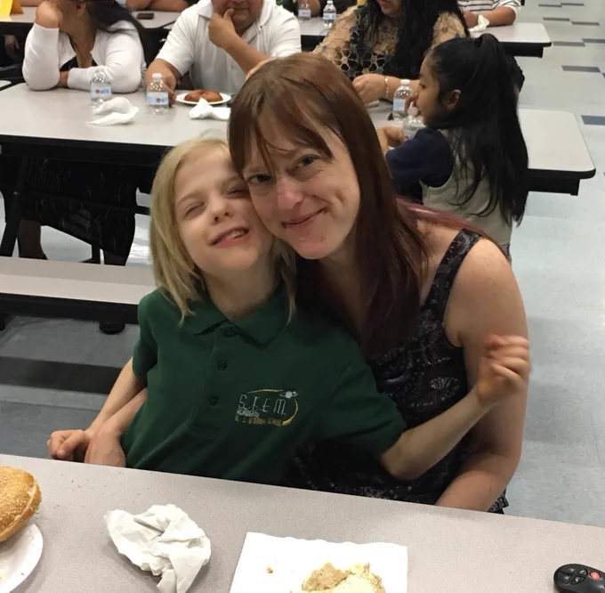 students and their families at the behavior hall of fame induction ceremony