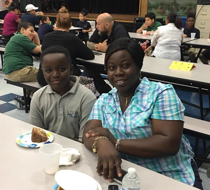 students and their families at the behavior hall of fame induction ceremony