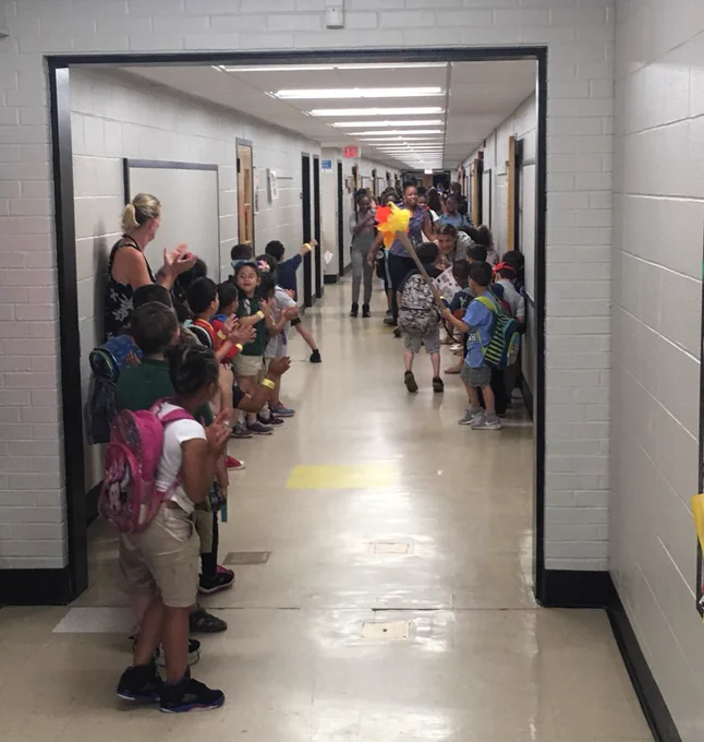 Hallway Lined with Students