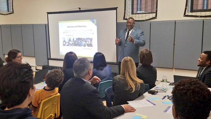 Dr. Repollet speaking to the group