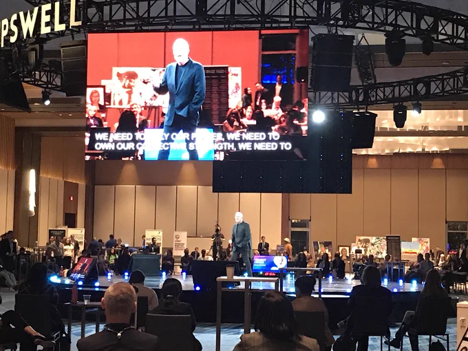 Robert Eggers is shown on the screen with the caption “we need to rally our power, we need to own our collective strength”