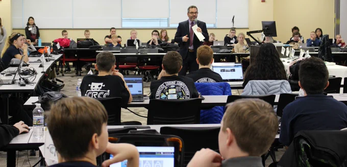 Matt Stem speaks to students participating in the Cyber Robotics Coding Competition