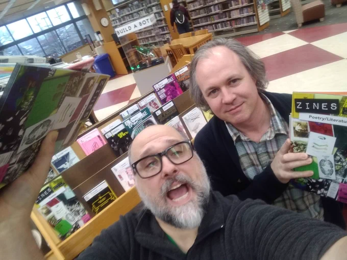 Ryan and Grier setting up the Library's new Zine Collection @MCPLIndiana.