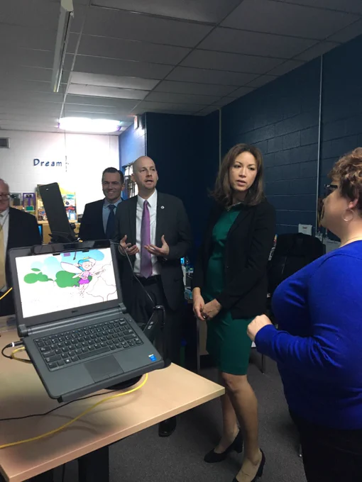 Commissioner Turner and Schwinn talking with school staff