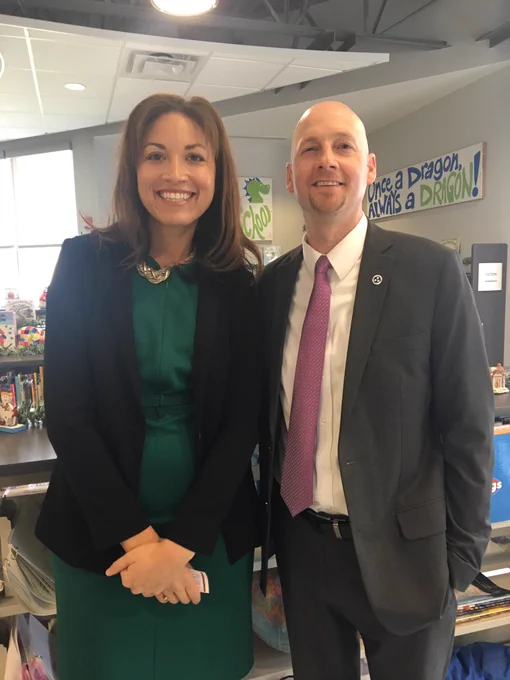 Dr. Penny Schwinn and Commissioner Turner smiling