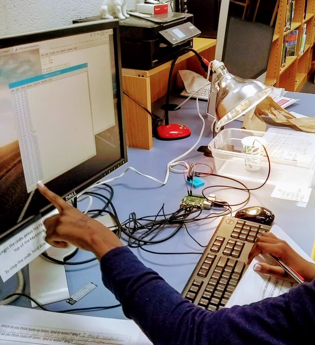 student identifying temperature with code