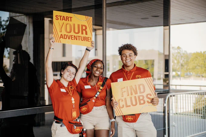 Three Cyclone Aides holding signs that say Start Your Adventure and Find Clubs