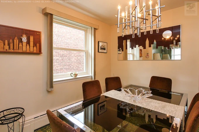 A pretty dining room in this lovely Brooklyn home where we installed all new windows. This pristine room with retro decor and art paying tribute to New York City, looks wonderful with the newly installed double hung window in the color Canvas. Find out how easy it is to replace your window with Renewal by Andersen of Long Island, Queens and Brooklyn.