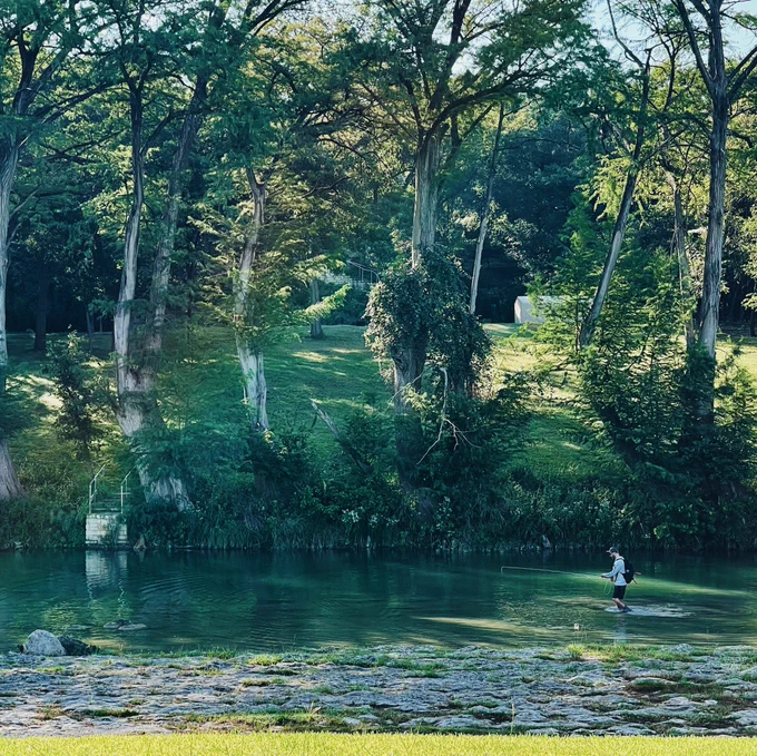 Andre walking down the river