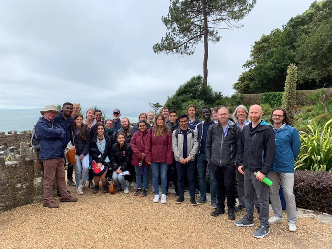 A group of young people from Oxford University with the BCP flood and coastal team near Bournemouth coast.