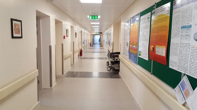 Colour Photograph showing a Hospital Circulation Route which is, for the most part, Clear and Unobstructed ... a critical requirement in Fire Safety for All design and management ... for all Building Types.